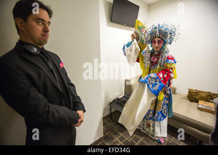 Los Angeles, California, USA. 31st Jan, 2015. Tom Jones looks on as Beijing Opera actress Sun Ping, gets ready at the back stage before the show, The Drunken Beauty, begins at the Wallis Annenberg Center for the Performing Arts in Beverly Hills, California on January 31, 2015. Sun, a national first-class actress, member of the international Dramatists Association, dean of the Art Research School of Beijing Foreign Studies University and executive director of the Research Institute on Chinese National Opera at Renmin University. With a history of nearly three hundred years, Beijing Opera is a Stock Photo