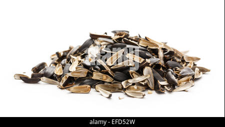 Sunflower seed husks on the white background Stock Photo