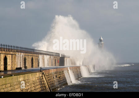 Tynemouth, UK. 1st Feb 2015. Strong northerly winds send waves crashing high over Tynemouth pier at the entrance to the river Tyne. (c) Washington Imaging/Alamy Live News Stock Photo