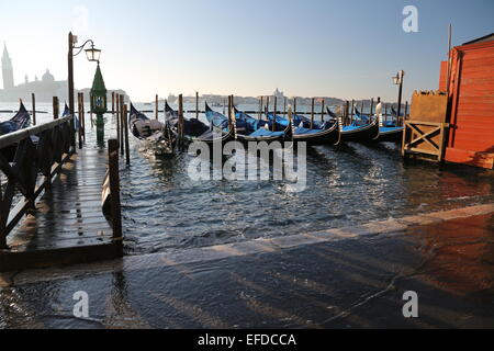 Venice, Italy. 31st January, 2015. Italy Weather: Gondolas Boat near Piazza San Marco at high tide. Credit:  FC Italy/Alamy Live News Stock Photo