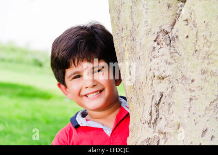 1 indian child boy park fun Stock Photo