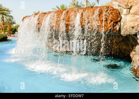 Waterfall in the family swimming pool of the Emirates Palace Hotel, Abu Dhabi. Stock Photo