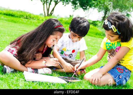 3 indian children Students park Drawing Stock Photo