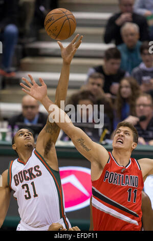 Milwaukee, WI, USA. 31st Jan, 2015. Milwaukee Bucks center John Henson #31 and Portland Trail Blazers center Meyers Leonard #11 tipoff for the start of NBA game between the Portland Trail Blazers and the Milwaukee Bucks at the BMO Harris Bradley Center in Milwaukee, WI. Bucks defeated the Trail Blazers 95-88. John Fisher/CSM/Alamy Live News Stock Photo