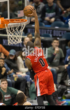 Milwaukee, WI, USA. 31st Jan, 2015. Portland Trail Blazers guard Damian Lillard #0 scores on a slam dunk during the NBA game between the Portland Trail Blazers and the Milwaukee Bucks at the BMO Harris Bradley Center in Milwaukee, WI. Bucks defeated the Trail Blazers 95-88. John Fisher/CSM/Alamy Live News Stock Photo