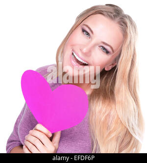 Portrait of cute cheerful female with big paper heart in hands isolated on white background, healthy lifestyle Stock Photo