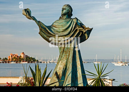 Sculpture of person holding a shell and bay,  Malecon (seaside promenade), La Paz, Baja California Sur, Mexico Stock Photo