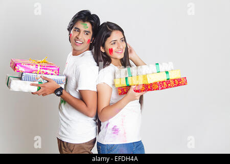 2 indian couple Holi Festival Gift Stock Photo