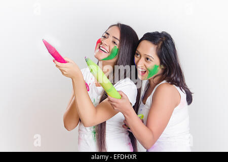 2 indian ladies Holi Festival fun Stock Photo