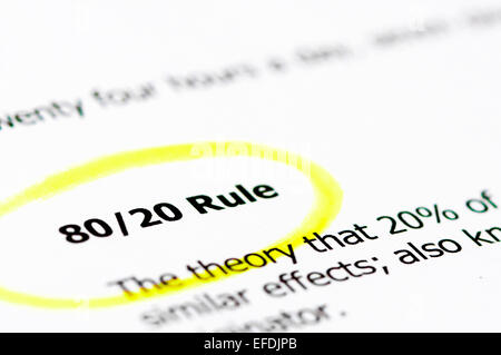 80/20 Rule words highlighted with yellow on white paper, copy space available, Marketing and Economy Concept Stock Photo