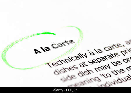 A la Carte words highlighted with green on white paper, copy space available Stock Photo