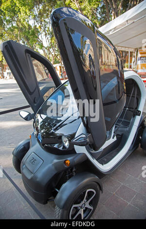 Oaxaca, Mexico - Renault's Twizzy, a battery-powered two-passenger electric car, on display in El Llano park. Stock Photo