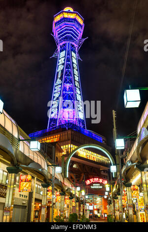 OSAKA - NOVEMBER 24: Tsutenkaku Tower in Shinsekai (new world) district at night on November 24, 2014, in Osaka. It is a tower a Stock Photo