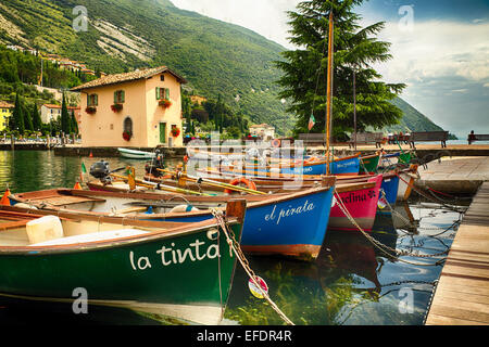 Low Angle View of Small Boats in a Harbor, Torbole, Lake Garda, Italy Stock Photo