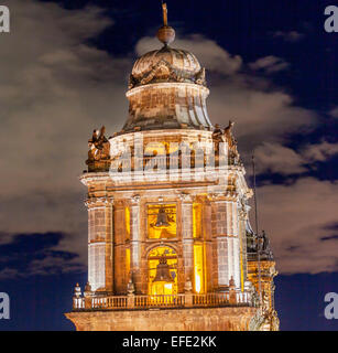 Metropolitan Cathedral Steeple Bells Statues in Zocalo, Center of Mexico City, at Night Stock Photo