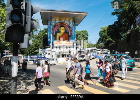 Huge sitting Buddha statue with large roof near train station, in city centre,Kandy,Sri Lanka,locals, Stock Photo