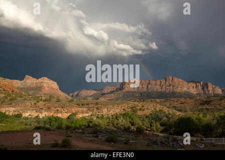 Stormy sky with rainbow over Zion National Park, Utah, USA Stock Photo