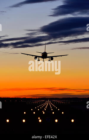 Airplane landing at sunset, Airbus, Munich Airport, Erding, Munich, Bavaria, Germany Stock Photo
