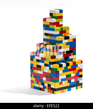 Tower built of colorful plastic building blocks Stock Photo
