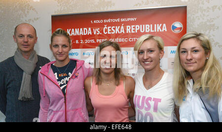 The Czech tennis team that will meet Canada in the first round of the Fed Cup next week will play without its best two players, Petra Kvitova and Lucie Safarova. The team´s captain Petr Pala (left to right) nominated Karolina Pliskova, Lucie Hradecka, Tereza Smitkova and Denisa Allertova for the matches played in Quebec City on February 7-8. Apart from Hradecka, none of the team has played the Fed Cup before. Pala said the team is 'good enough' to win in Canada. The Team attend a news conference in Prague, Czech Republic on Sunday, February 1st, 2015. (CTK Photo/Michal Dolezal) Stock Photo