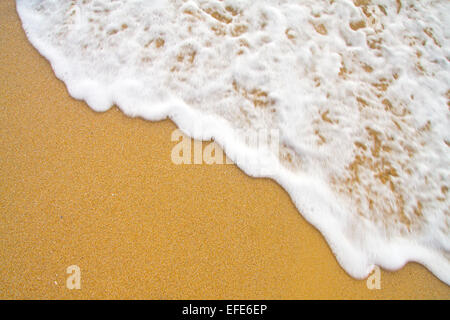 sand and moving wave background Stock Photo