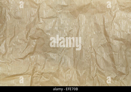 creased ocher greaseproof paper, blank, close up, full frame Stock Photo
