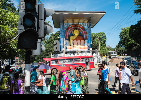 Huge sitting Buddha statue with large roof near train station, in city centre,Kandy,Sri Lanka, Stock Photo