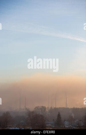 smog over plant Stock Photo