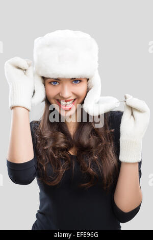 Beautiful young woman in winter clothes Stock Photo