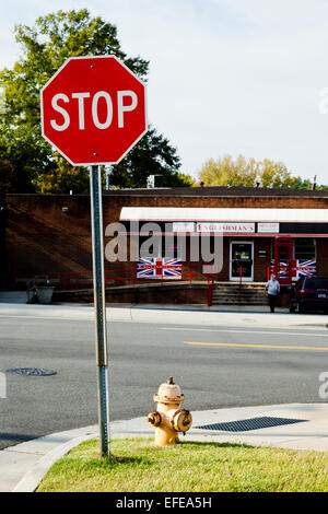 Stop sign on the corner of Pelton Street and Clanton Road, Charlotte, USA Stock Photo