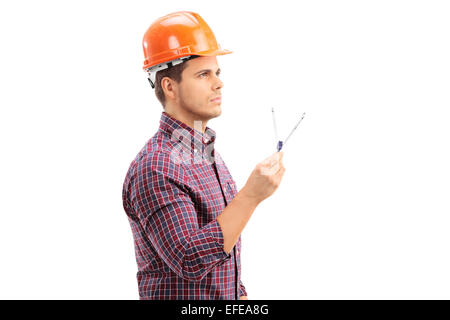 Male architect holding a drawing compass isolated on white background Stock Photo