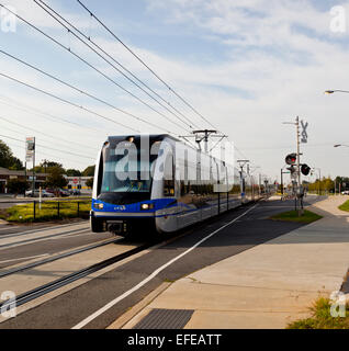 Light rail engine and carriages at I45/South Boulevard, Charlotte, North Carolina, USA Stock Photo