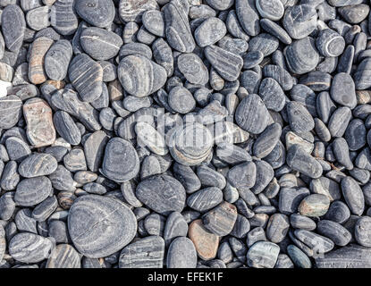 Nature background made of dry round stones. Stock Photo