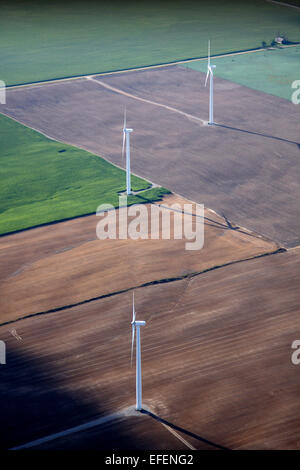 Wind turbines amongst farmland in the Saginaw Bay area of Michigan. Stock Photo