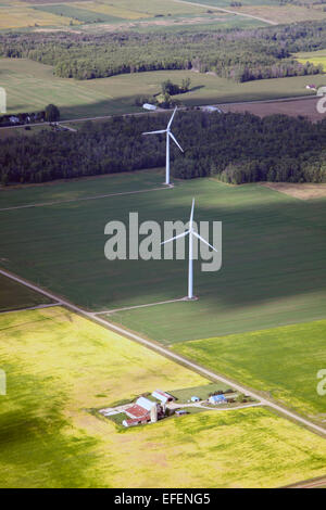 Wind turbines amongst farmland in the Saginaw Bay area of Michigan. Stock Photo
