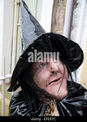 A witch that sits outside the shop 'Witches Galore' in the village of Newchurch in Pendle Lancashire. Stock Photo