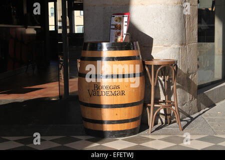 Barrel table and stool outside of bar in Girona (Gerona), Catalonia, Spain Stock Photo