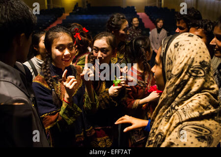 New Delhi, India. 2nd Feb, 2015. Students of China's Central Academy of Drama talk with Indian audience after their show at the 17th Bharat Rang Mahotsav, or International Theatre Festival of India, in New Delhi, India, Feb. 2, 2015. Students of China's Central Academy of Drama showed three short pieces mixing Chinese traditional culture and dance at the festival. © Zheng Huansong/Xinhua/Alamy Live News Stock Photo