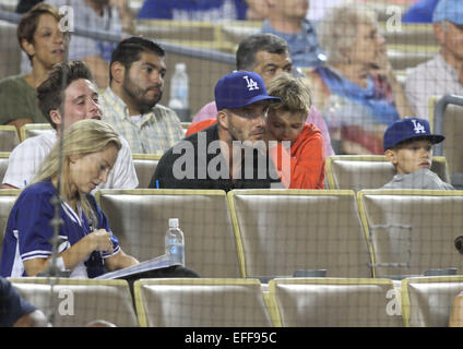 David Beckham takes his three sons to watch the Los Angeles Dodgers v Atlanta Braves baseball game at Dodger Stadium. The Dodgers defeated the Braves by a final score of 2-1.  Featuring: David Beckham,Brooklyn Beckham,Romeo Beckham,Cruz Beckham Where: Los Stock Photo