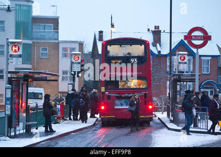 South London, UK. 03rd Feb, 2015. Picture shows early morning commuters at the main bus depot in Wimbledon, South Wimbledon, where there has been snow showers across parts of London. Credit:  Jeff Gilbert/Alamy Live News Stock Photo