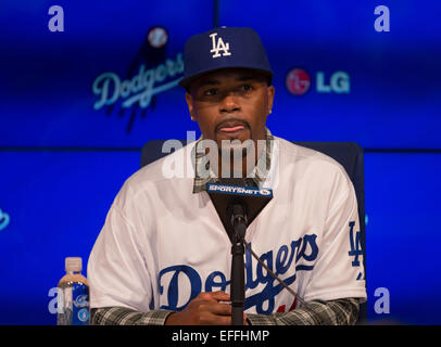 January 7, 2015 Los Angeles, CAJimmy Rollins takes a photo by the  retired jersey of ten time All Star and Hall of Fame member Pee Wee Reese  after his introductory press conference