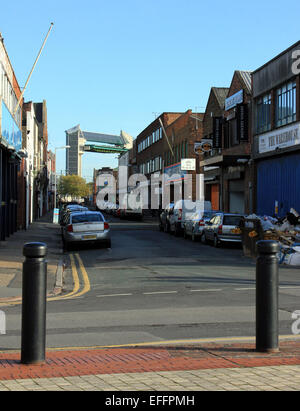 The Hull tidal barrier rises above Humber Street in Hull. Stock Photo