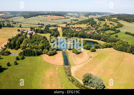 Aerial view of West Wycombe Park stately home and lake in rural landscape, Buckinghamshire, England Stock Photo