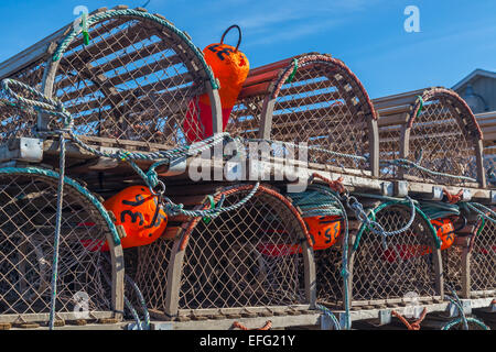 Lobster traps propped up on a wharf in rural Prince Edward Island, Canada. Stock Photo