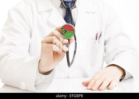 Doctor holding stethoscope with flag series - Vanuatu Stock Photo