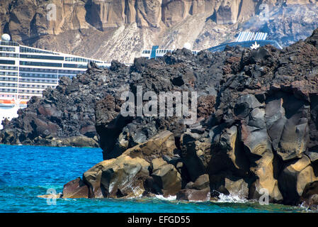 volcanic island nea kameni with santorini in greece Stock Photo