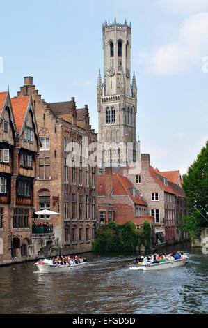 Belgium, Flanders, Bruges, Bellfort-Hallen Bell Tower, Tourists on Boat Stock Photo