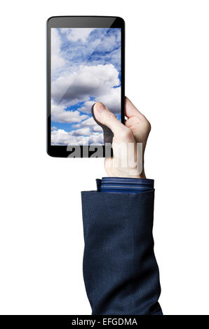 Hand holding a digital tablet with clouds on the screen Stock Photo