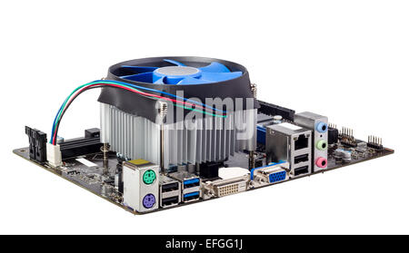 Computer motherboard isolated on white background with CPU cooler Stock Photo