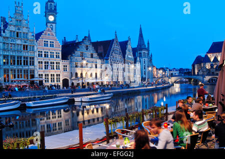 Belgium, Flanders, Ghent, Waterfront Graslei River at Night, Restaurant Stock Photo